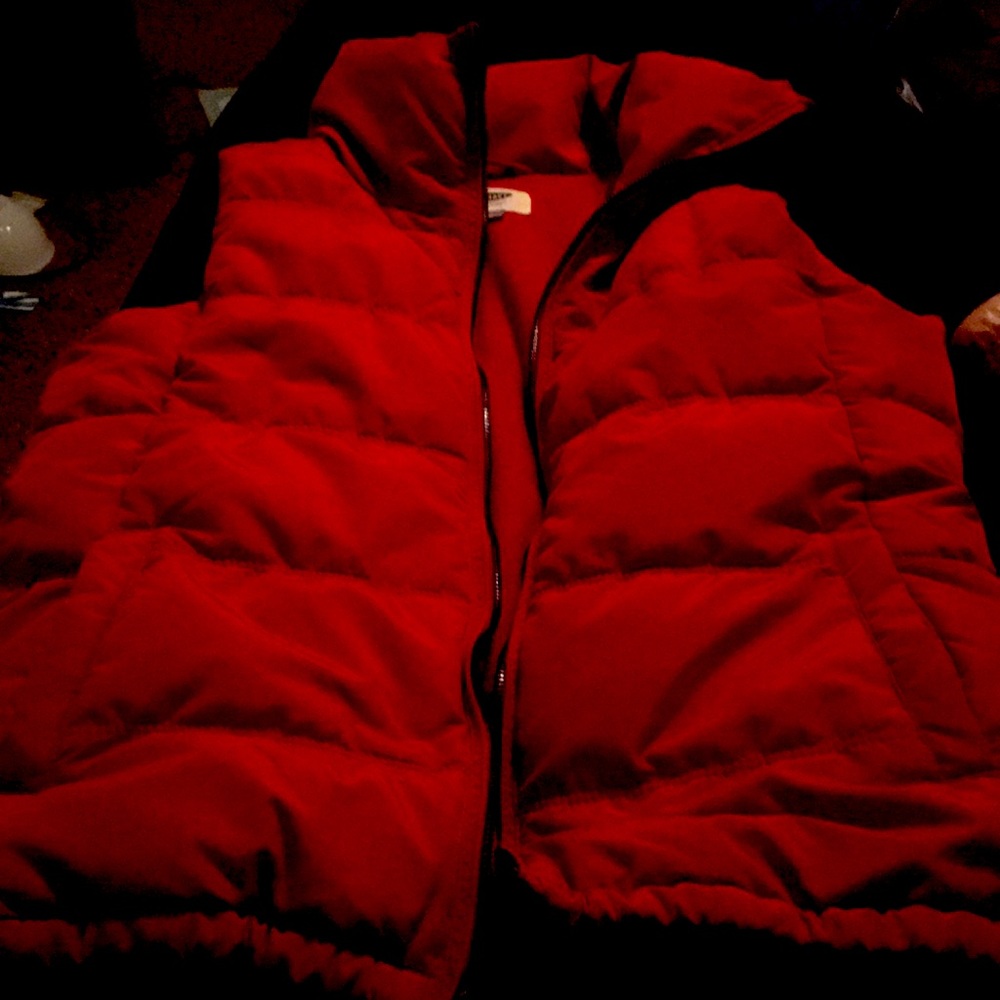 Old Navy puffer vest. No tags. Worn once. Color called red saffron.